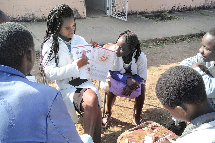 Children in a classroom with teacher