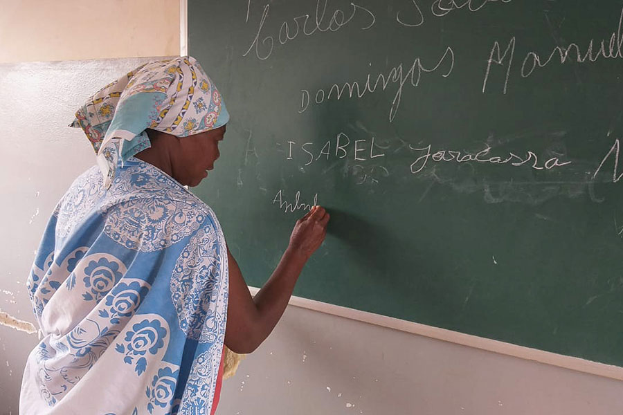 Children in a classroom with teacher