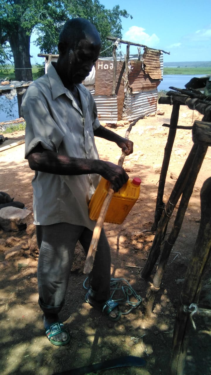 The project helped families create their own Tippy Tap handwashing systems