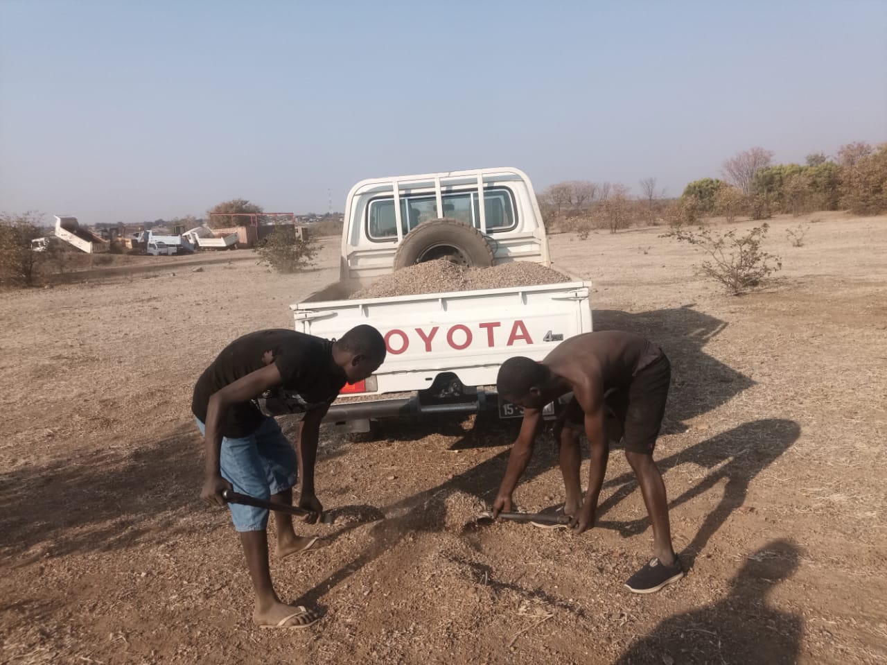 Fine gravel being collected in the municipality of Cahama for the construction of concrete tank covers