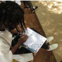 The students complete questionnaires that provided baseline information on knowledge and practices related to menstrual health management.